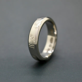 Emily Proudfoot - Hand Engraved finger print  on a 6mm chamfered platinum wedding ring. Bespoke designed bevel band.