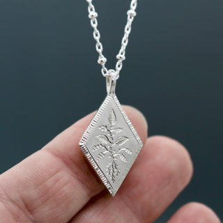 Hand Engraved recycled silver jewellery by british designer and engraver Emily Proudfoot