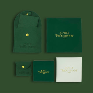 Jewelry boxes for Emily Proudfoot ring set: green and white gift boxes