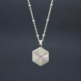 Pink Sapphire Illumination Pendant - Hand engraved hexagon pendant with guilloché sunray pattern, stone set eye and milgrain detail - Emily Proudfoot
