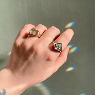 Kite Signet Ring by Emily Proudfoot Jewellery, Yorkshire jeweller, handcrafted with tapered band and bezel-set Amethyst, Topaz, or Black Onyx, unisex design, personalisable with interior engraving or custom centre stone.