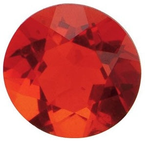 Red faceted gemstone with a round cut and strong reflections