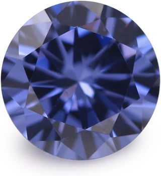 Blue gemstone with faceted cut and deep navy tones