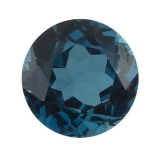 Round faceted teal gemstone with deep blue sections
