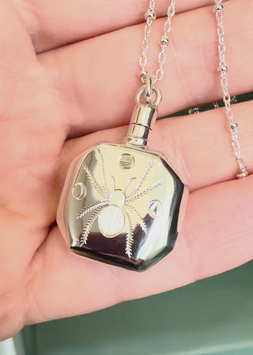 Hand engraved silver spider perfume bottle pendant necklace with solstice eclipse moons, made for perfume or ashes - Emily Proudfoot