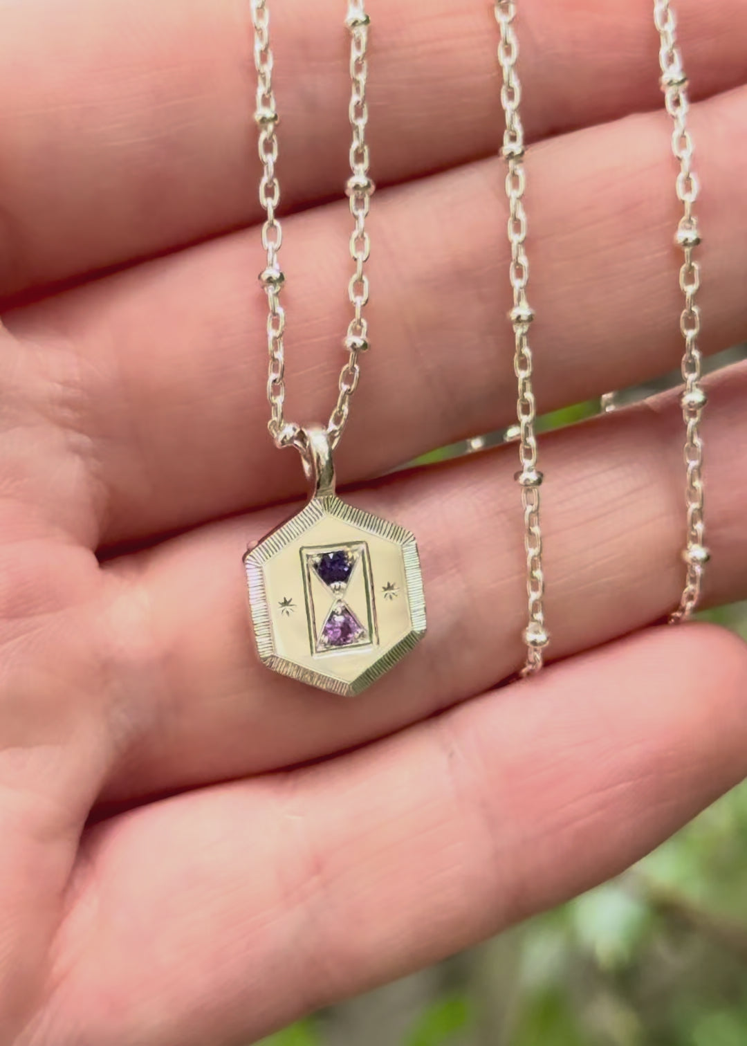 Purple sapphire birth stone hour glass stone setting on a hexagon silver pendant necklace with engraved bright cut border - Emily Proudfoot 