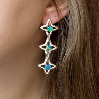 Star chain earrings with three star-shaped opal stones, silver-tone with blue-green glow