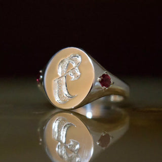 Silver gothic letter signet ring with engraved letter and red round stone